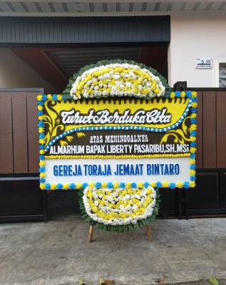 Papan Bunga Duka di Purabaya